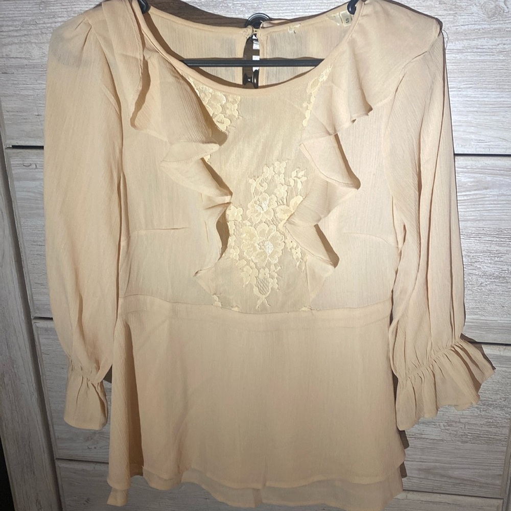 Cream colored blouse